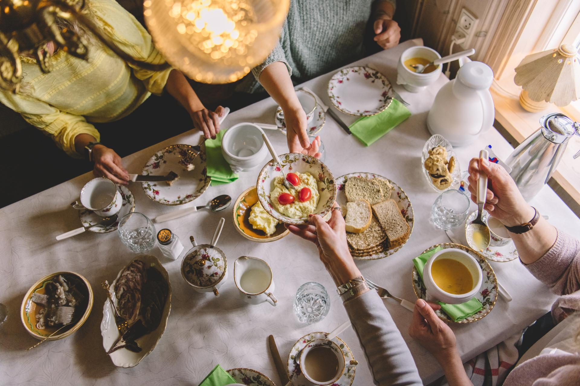 Supper with a local family. People are enjoying a warm lunch. Runavík, Faroe Islands. Taken by Klara Johannesen.  