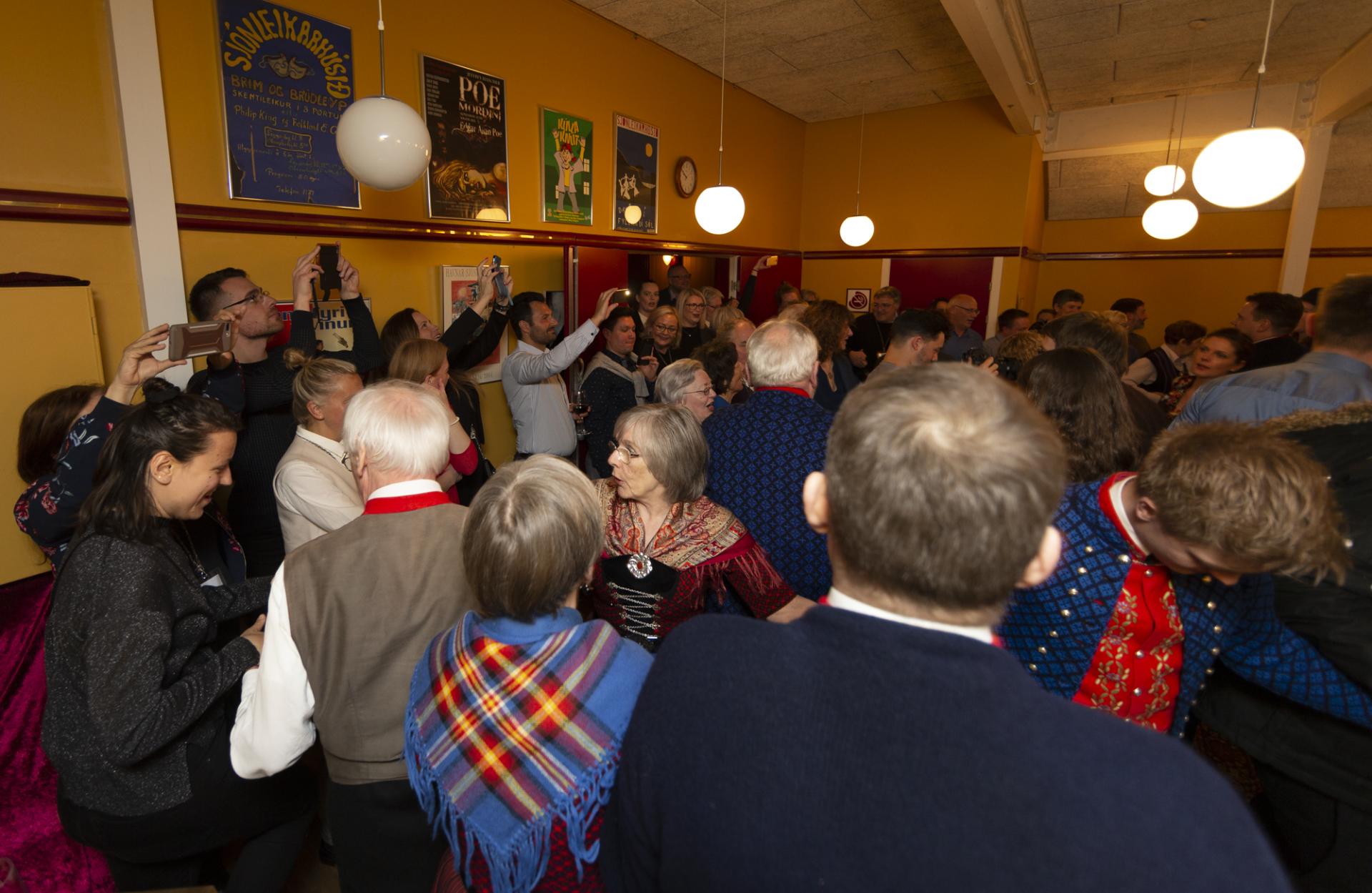 Faroese chain dance as part of the cultural entertainment at the annual Visit Faroe Islands famshop Sjónleikahúsið